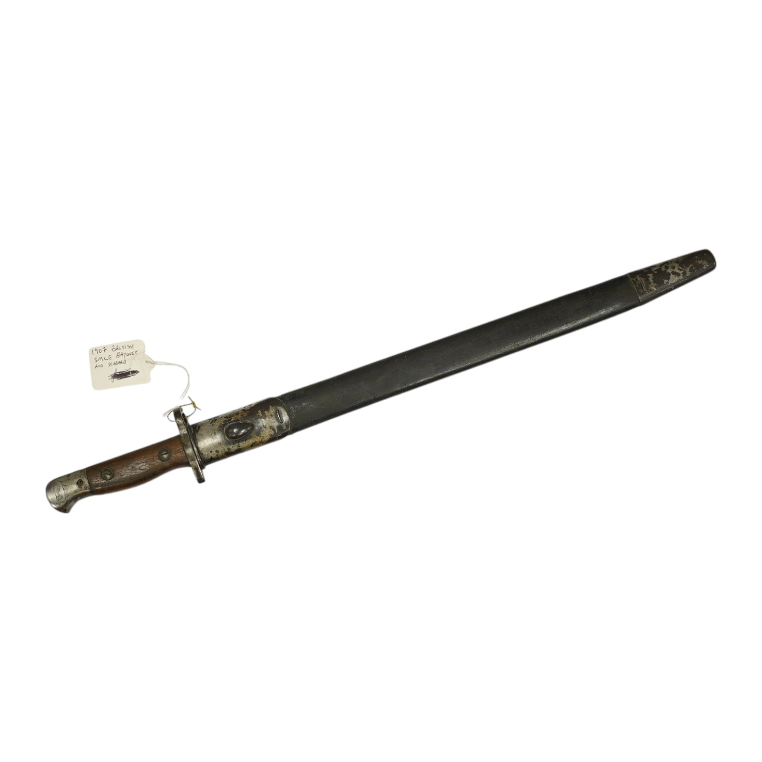 A 1907 pattern bayonet, the blade with issue stamp for 1918, with regulation hilt and in its regulation leather scabbard. Condition - good